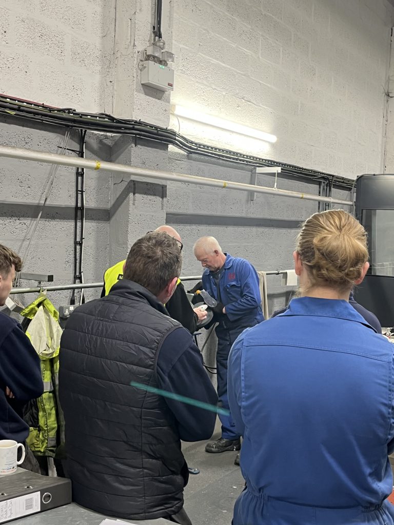 A photo of the instructor assisting one of our engineers